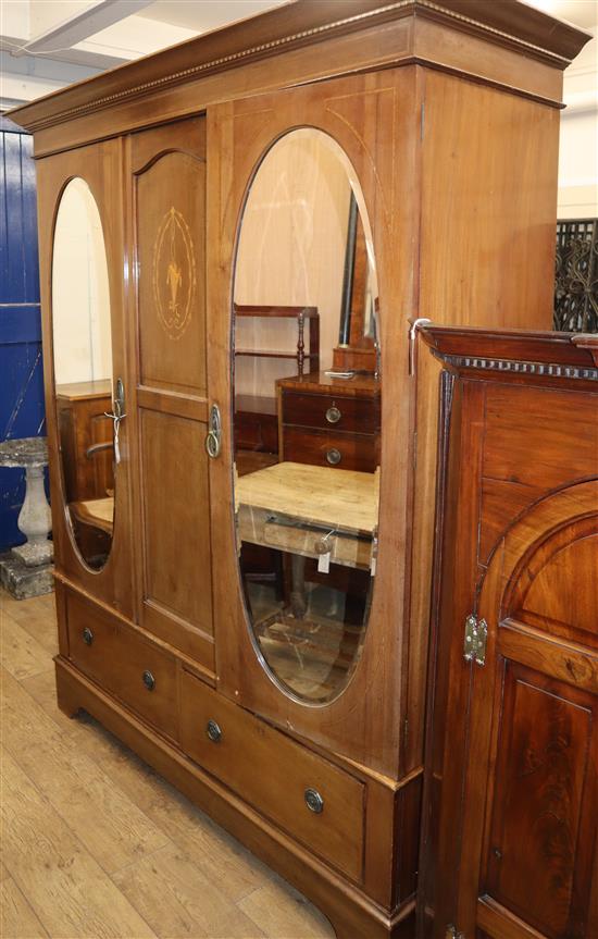 An Edwardian inlaid mahogany wardrobe W.167cm